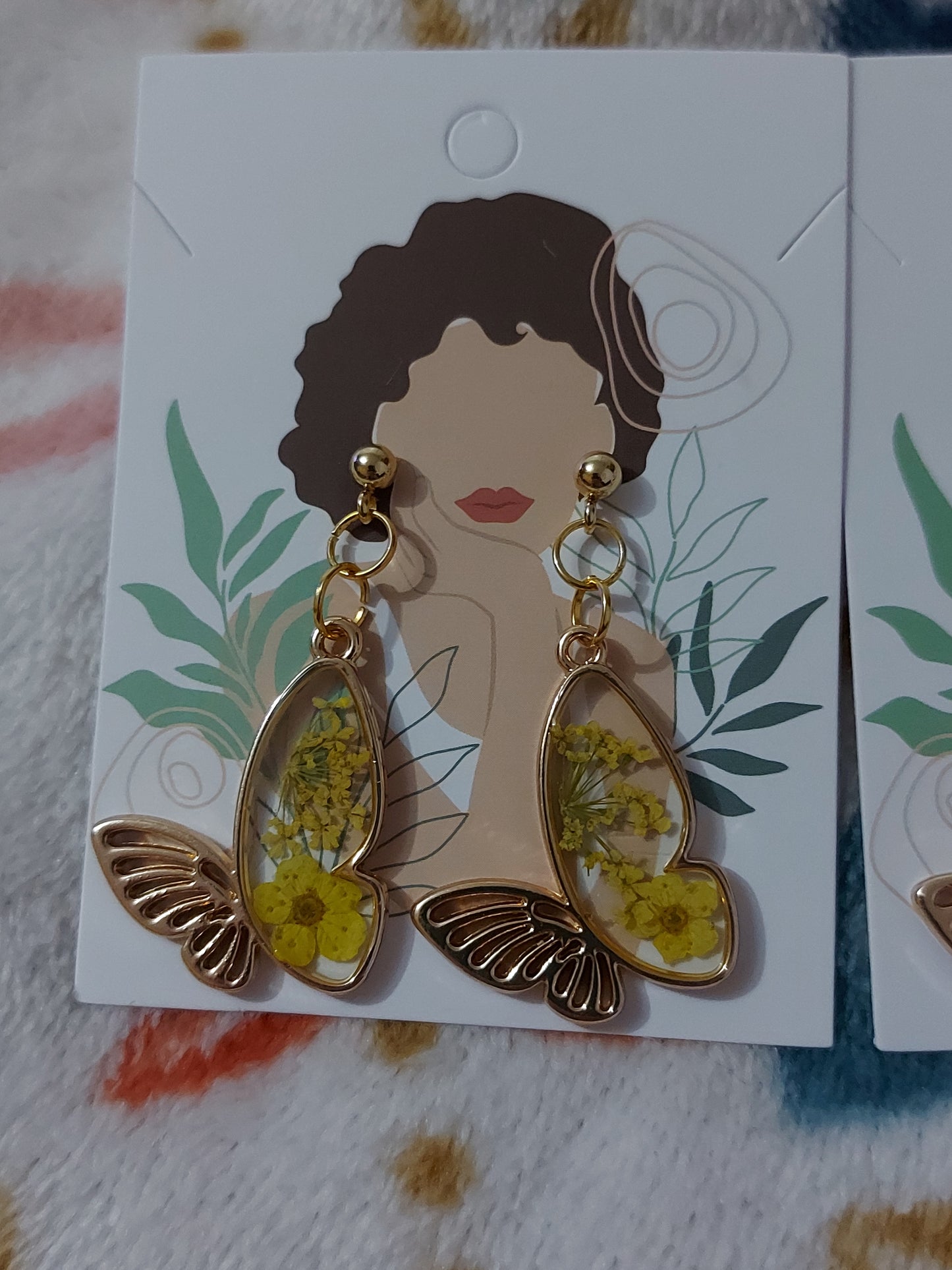 Yellow floral butterfly earrings