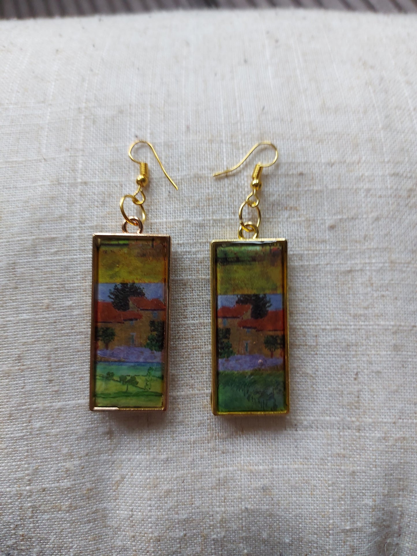 Artist painting earrings